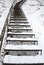 Stairs covered snow leading steep hill winter