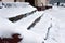 The stairs are covered with snow. Neatly. The problem of snow removal in the city. Not cleaned