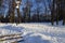 Stairs covered with white fresh snow on a sunny day in Kadriorg park. Trees on the back. Landscape. Tallinn, estonia