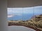 Stairs and glass from the viewpoint of the river to the island of La Graciosa. Lanzarote