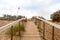 Stairs lead to the top of the dunes.