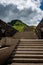 Stairs leading up to the puy mary an old volcanoe ,auvergne, cantal France , landcape ,with cloudy sky ,walking ,adventure holiday