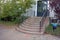 Stairs made of different stones and a door