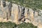 A stairs path encrusted in a rock over a river