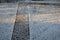 Stairs and ramps for wheelchairs made of good-looking concrete. stone surfaces of paving and stairs illuminated by the sun. Rusted