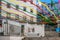 Stairs of San Miguel in Alfama neighborhood, adorned with many colors during the holidays of San Antonio, Lisbon