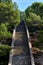 Stairs steps lead up to the Cala Falco beach in Majorca, Spain