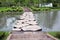 Stairs, stone walkways across the water.