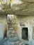 Stairs in stony cave house