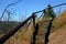 Stairs sunk into the slope resembling a wooden ladder at the same time as the terrain. fortification of a slope in front of a larg