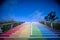 Stairs to heaven in rainbow colours and blue sky