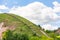 Stairs to the mountain. The hilly Bank of the Volga in Tetyushi, Tatarstan, Russia. Sunny summer day. White clouds in a blue sky