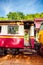 Stairs train and red Railway carriages