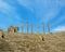 Stairs, viewing stands and columns against blue sky at ancient Roman theater of Leptis Magna in Libya