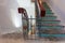 Stairs with wooden banisters is the part of interior of apartment during upgrade or remodeling, renovation, extension, restorat