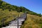 Stairs wooden pathway of the Puy de DÃ´me volcano mountain in center france