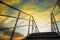 Stairway with colourful and dramatic sky at sunset