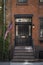 Stairway and a flag, old apartment, New York City