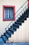 Stairway, Iron Railing and Red-Framed Window