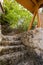 Stairway to the Japanese shrine with wooden Japanese gate that made from solid stones and cement