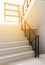 Stairwell fire escape in condominium, apartment or modern building with sun rays