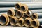 Staked insulated pipes for district heating