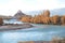 Stakna Gompa and Indus river before sunset with cloudy sky and mountains