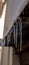 stalactite ice hangs from the roof of the house winter background