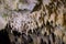 Stalactites and stalagmites in Dirou Cave, Greece