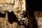 Stalactites and stalagmites inside natural limestone cave. Natural formations