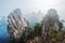 The stalagmite peak in clouds and mist