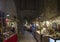 Stalls and people inside the ancient Rocca Paolina building in Perugia, Italy