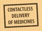Stamp grunge rubber Contactless delivery of medicines.  Contactless delivery of medicines  stamp on  cardboard background your web