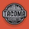 Stamp or label with name of Tacoma, Washington