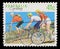 Stamp printed in Australia shows the Cycling