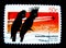 A stamp printed in Australia shows an image of Silhouette two cockatoos bird for stamp series of Australian Innovation.