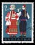 Stamp printed in Bulgaria, shows man and woman in Bulgarian national costumes from Lovech region