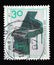 A stamp printed in Germany shows Pedal Piano, Musical Instrument