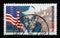 A stamp printed in Germany shows United States flag, George Marshall and bomb site, 50th Anniversary of the Marshall Plan