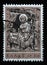 Stamp printed in Greece shows Virgin (wood carving Church of St. Nicholas  Galaxeidon)