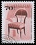 Stamp printed in Hungary shows antique chair