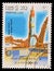 Stamp printed in the Laos, is pictured launching the spacecraft Apollo Program Apollo-Soyuz