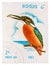 Stamp printed in LAOS shows Common Kingfisher Alcedo atthis , from series Birds