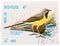 Stamp printed in LAOS shows Grey Wagtail Motacilla cinerea