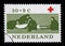 Stamp printed in Netherlands shows Volunteers helping sick on a stretcher, Red Cross series