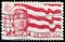 Stamp printed in USA, shows girl scouts and flag