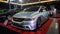 Stanced silver Honda Odyssey on car limbo show