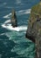 A stand alone rock on the ocean