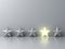 Stand out from the crowd and different creative idea concepts , One glowing star standing among other dim stars on grey background