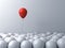 Stand out from the crowd and different or think outside the box creative idea concepts One red balloon floating above other whites